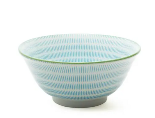 Ceramic bowl with blue and white pattern on a white background