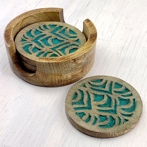 fair trade carved peacock design coaster set of four with holder